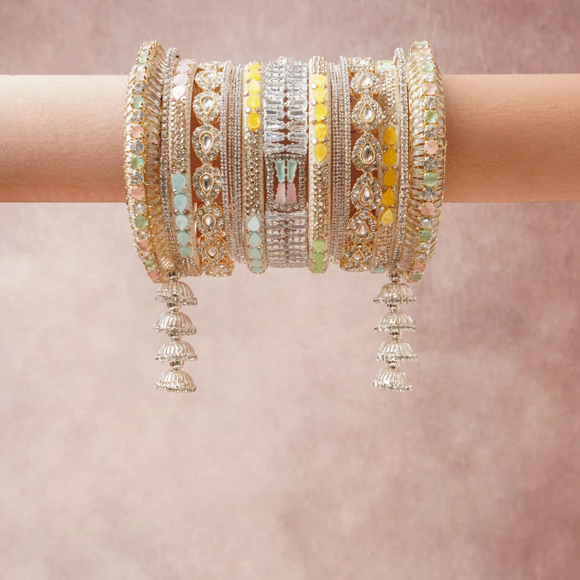 A majestic Gold set, complemented by Diamond White, Pastel Mint Green, Pastel Lemon Yellow, Pale Rose Pink, Soft Sky Blue, Lavender Mist, multicolor featuring Gold-plated Alloy, Cubic Zirconia, Opaque Enamel, Faceted Glass, Silver-plated Alloy.
Rich, ceremonial, and designed to be passed through generations.